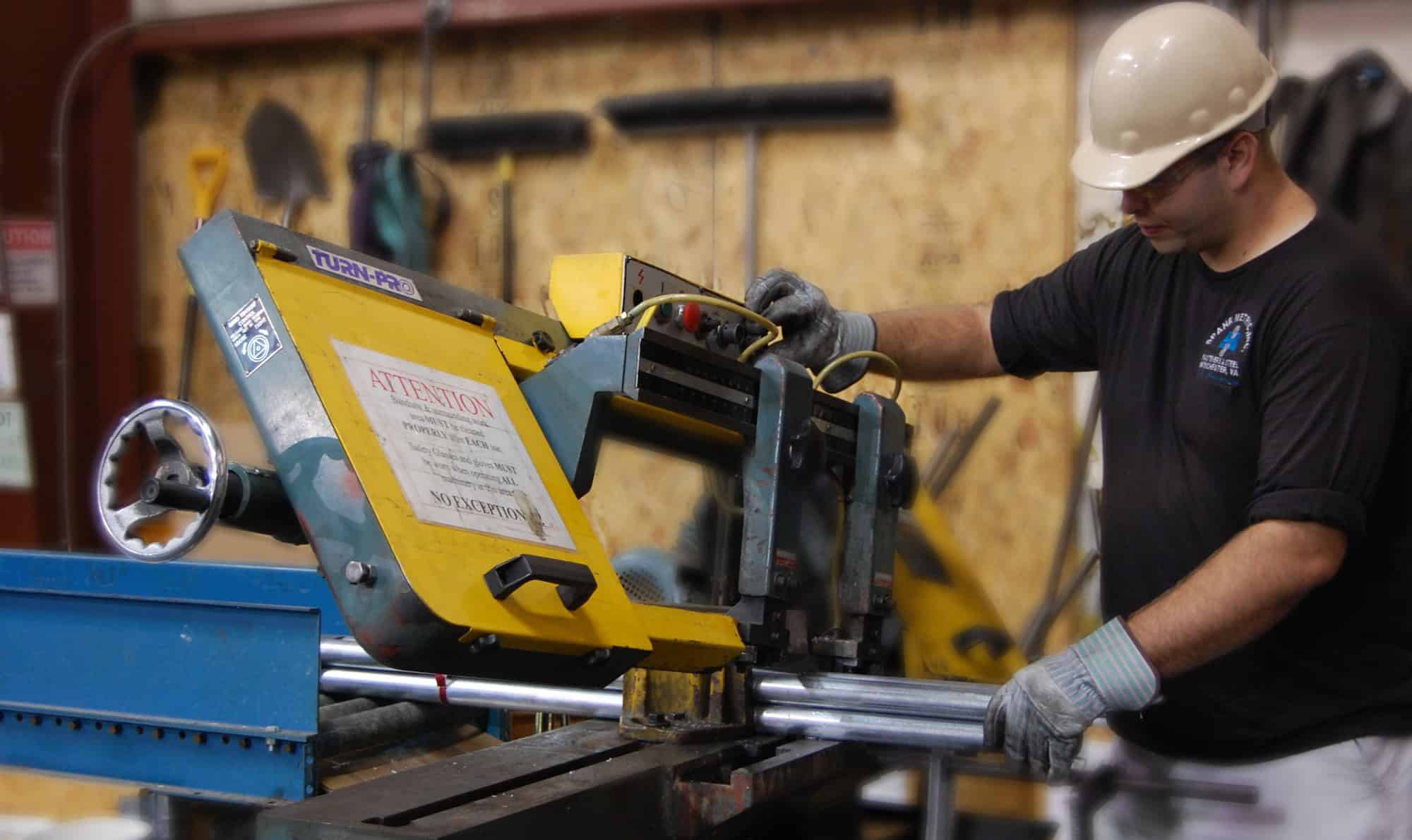 Spahr Metric warehouse manager cutting steel for shipment