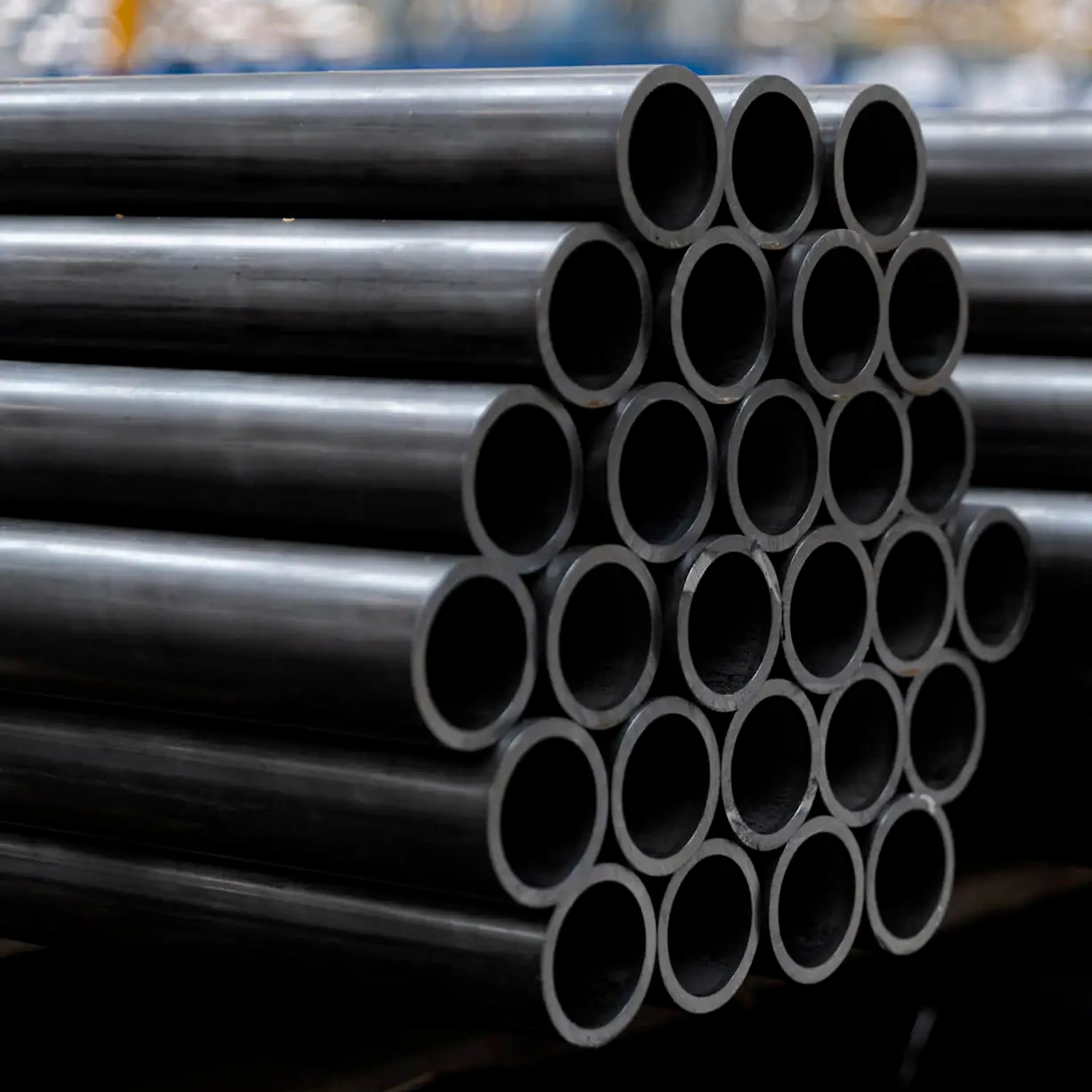Carbon steel round tube stacked in a pile
